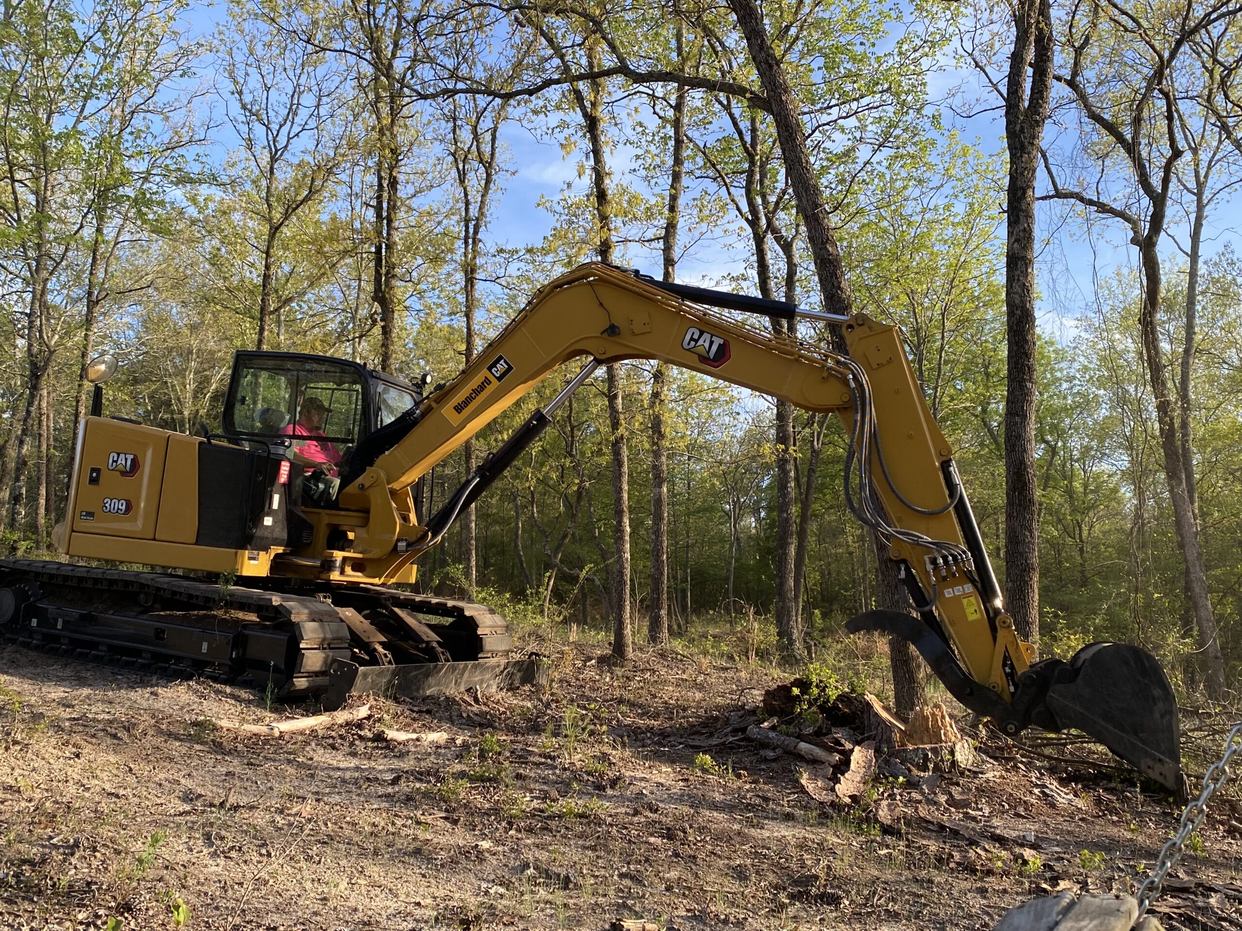 Our Equipment: excavator is pictured